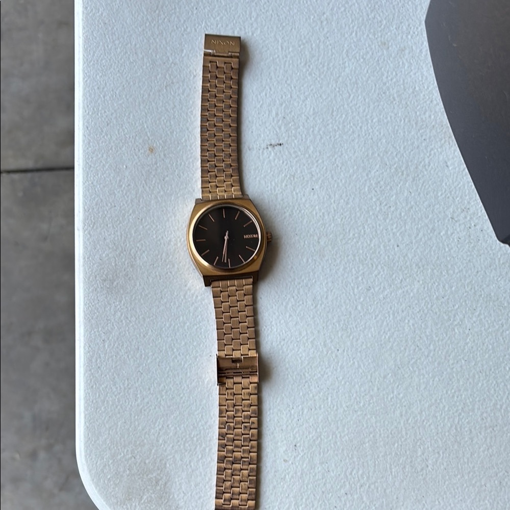 Nixon Gold and Black Minimalist Watch